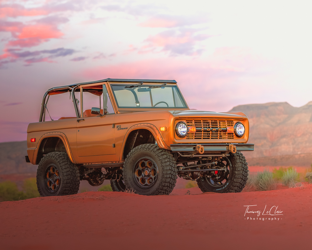 Track panning photograph, car passing at speed